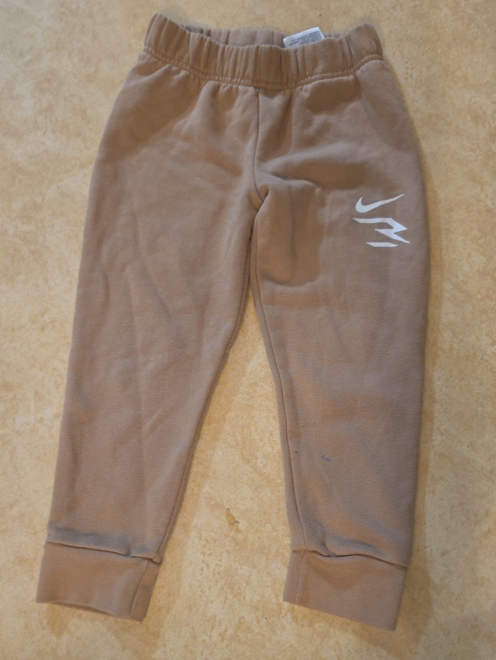 Kids NIKE Tan Sweatpants with White Logo - Athletic Joggers